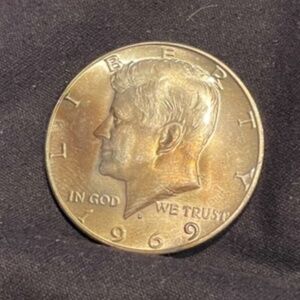 1969 Kennedy 40% Toned silver circulated coin (1) D  #206126120884